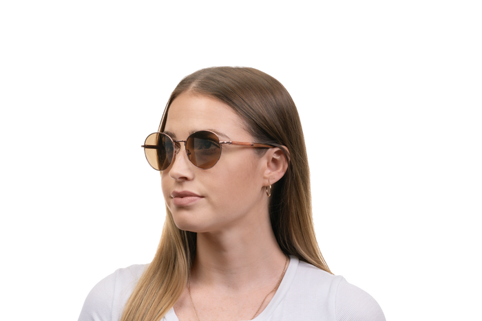 Woman wearing JORD Holly - Padauk & Rose Gold Titanium sunglasses