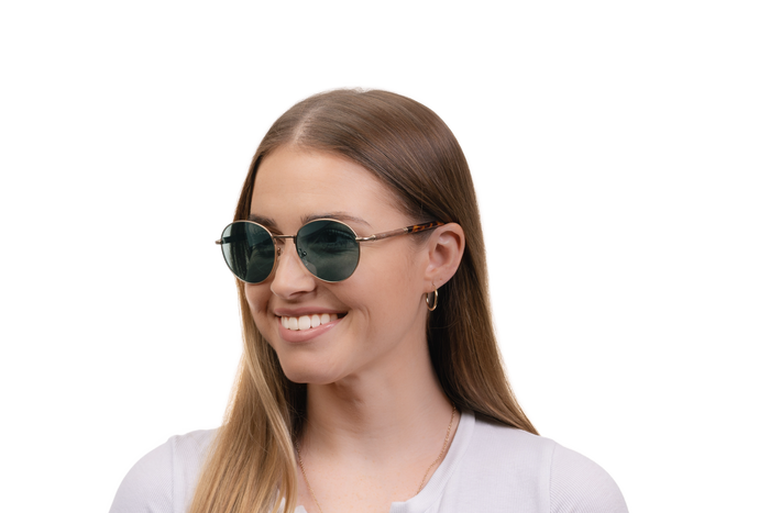 Woman wearing JORD Holly - Walnut & Matte Gold Titanium sunglasses