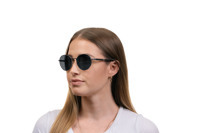 Woman wearing JORD Holly - Ebony & Gunmetal Titanium sunglasses